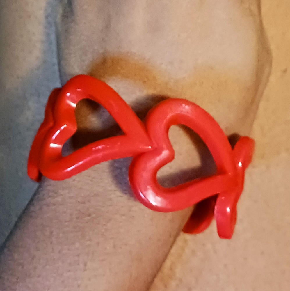 Very cute red bracelet with hearts